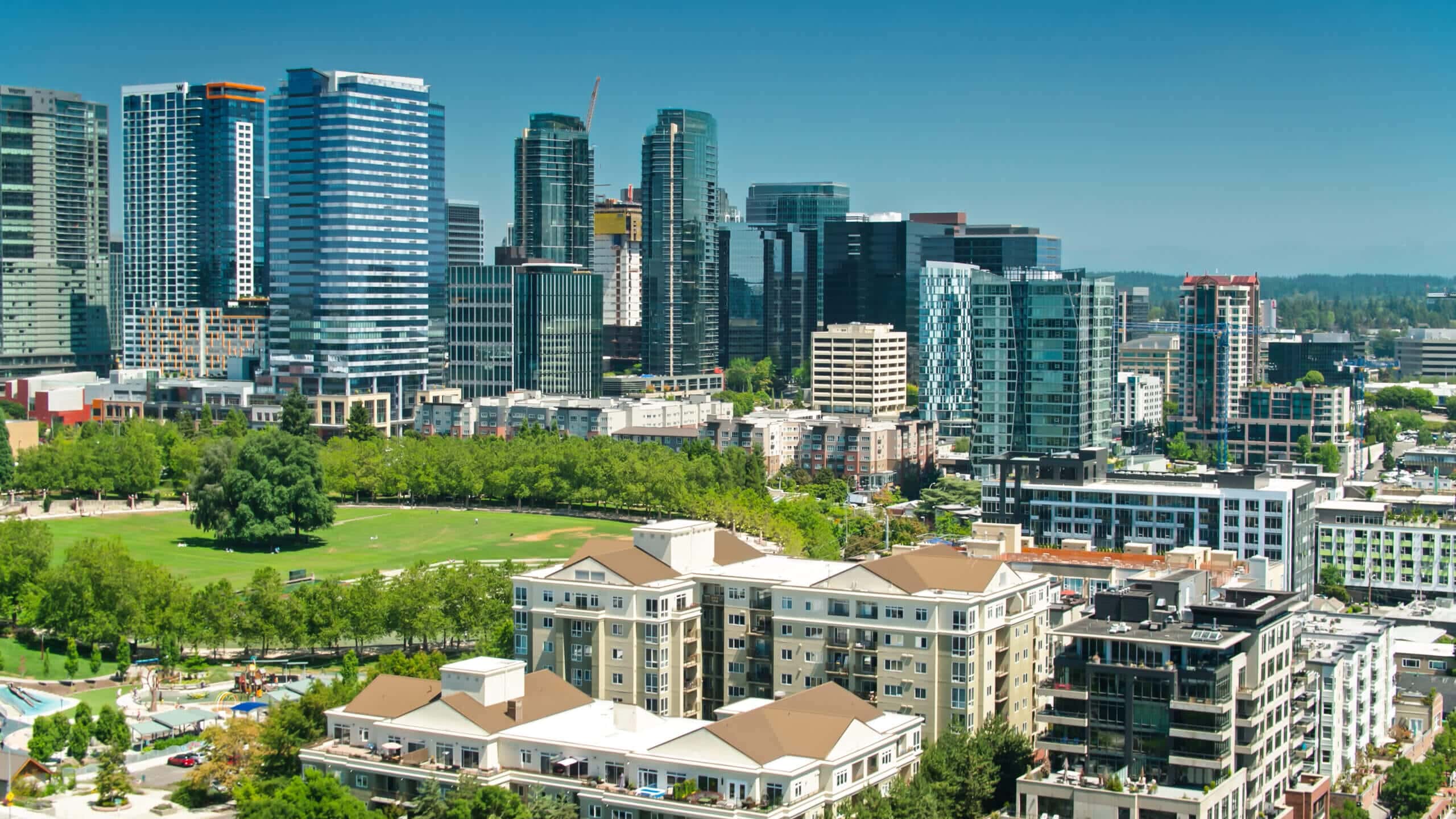 Seattle Eastside skyline with multifamily apartment buildings in the foreground